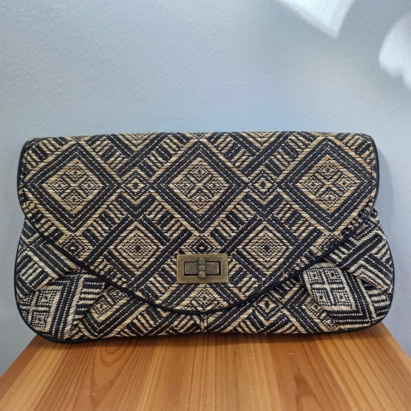Handbags - Black and Tan Woven Clutch